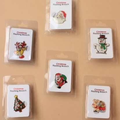 Picture of £1.49 CHRISTMAS FLASH BROOCHES (12) 0903